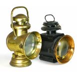 *A motor-car oil-powered lamp, being a Duco style, off-side fitting with all component parts,