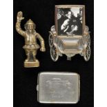 *Car mascot. A 1930s brass car mascot,  modelled as a police man with one hand raised, 8cm high,