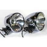 *Marchal Aerolux. A sided-pair of chromium-plated electric lamps,  both with fluted rear reflectors,