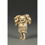 A JAPANESE IVORY NETSUKE OF GAMASENNIN, the portly figure holding two frogs on his shoulders,