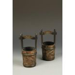 A PAIR OF JAPANESE PARCEL-GILT BRONZE VESSELS modelled as water pails, with engraved and low