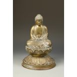 A JAPANESE LARGE GILT-BRONZE BUDDHA after the Kamakura statue, the deity seated with hands crossed