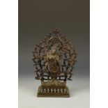 A NEPALESE BRONZE PADMAPANI, the bodhisattva swaying to one side and holding lotus sprays in each
