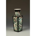 A CHINESE FAMILLE NOIRE SQUARE VASE of slightly tapering form, each side with relief pierced