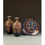 A PAIR OF LARGE JAPANESE CLOISONNÉ VASES AND A CHARGER, the vases of quatrefoil form, the