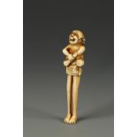 A SMALL JAPANESE IVORY ASHINAGA NETSUKE, the figure with arms crossed and a jovial expression, circa