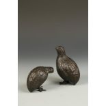 TWO JAPANESE BRONZE QUAIL FIGURES, the larger bird with its' head upright, the smaller bird with