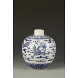 A CHINESE BLUE AND WHITE OVOID DRAGON JAR decorated with two opposing dragons chasing a flaming