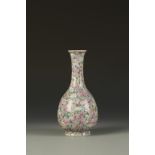 A CHINESE FAMILLE ROSE 'MILLEFIORE' VASE of bottle form, densely decorated in polychrome with