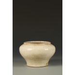 A CHINESE BLANC DE CHINE SQUAT VASE, the shoulder with a moulded ruyi band beneath a pronounced lip,