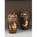 AN UNUSUAL PAIR OF LARGE JAPANESE VASES decorated in relief with mythical figures, on a phoenix