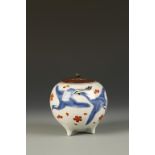 A JAPANESE OVOID TRIPOD VESSEL BY MAKUZU KOZAN (1842-1916), decorated in underglaze blue, iron red