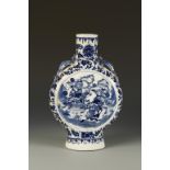 A LARGE CHINESE BLUE AND WHITE MOON FLASK, each side decorated with warriors on horseback in a