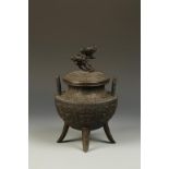 A JAPANESE BRONZE ORNATE COVERED TRIPOD KORO, by Oshima Joun, the finial formed as opening