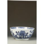 A LARGE CHINESE BLUE AND WHITE DEEP BOWL, the exterior decorated with birds and flowers in a
