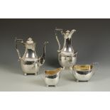 A MATCHED SCOTTISH FOUR PIECE TEA/COFFEE SET of baluster form, with gadrooned borders, angular