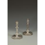 A PAIR OF GEORGE I STYLE CAST CANDLESTICKS with octagonal knopped stems and spreading bases, by