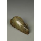 A CHINESE MOTTLED JADE RODENT in a recumbent pose, Han or later, 2.75" long