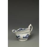 A WORCESTER BLUE AND WHITE PORCELAIN CREAM BOAT, 'Two Porter' pattern with moulded scroll cartouches