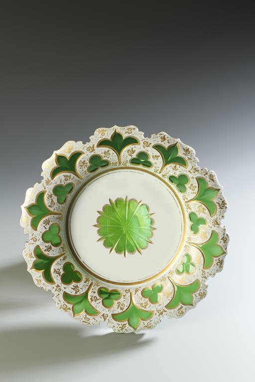 A BOHEMIAN STYLE GREEN AND WHITE OVERLAID DISH, 9.5" wide