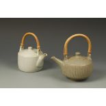 DAVID LEACH: A STONEWARE ORIENTAL STYLE TEAPOT with ribbed decoration and celadon green glaze,