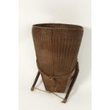 A SOUTH EAST ASIAN WICKER RICE PICKERS BASKET, of tapering form, 25" high