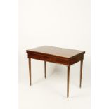 A FRENCH MAHOGANY AND BRASS STRUNG CARD TABLE on tapering fluted legs, late 19th century, 39.5"