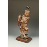 A CHINESE HARDWOOD FEMALE IMMORTAL with flowing robes, Qing, 19thC, 22.5" high