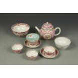 A CHINESE FAMILLE ROSE LOTUS-FORM PART TEA SET and two bowls, Qianlong, the teapot 7" long (9)