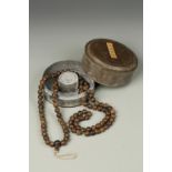 A CHINESE ALOESWOOD BUDDHIST ROSARY in a lead circular box, probably Republic, the beads 26" long