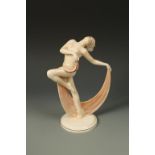 HERTWIG KATZHUTTE: AN EARTHENWARE MODEL OF A NUDE with her head back and draped with a pink scarf,