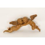 A ROCOCO STYLE CARVED PINE WALL MOUNT in the form of two kissing cherubs, 22" wide