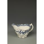 A WORCESTER BLUE AND WHITE PORCELAIN LOW CHELSEA EWER CREAM JUG, 'Convolvulus' pattern on moulded