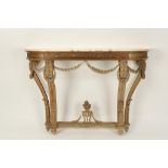 A NEO-CLASSICAL MARBLE TOPPED CONSOLE TABLE, the shaped veined yellow/white marble surface on a