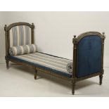 AN EMPIRE STYLE DAY BED with carved and painted frame, early 20th century, 78" wide