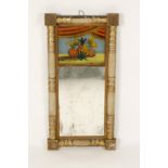 A GILT AND PAINTED WALL MIRROR, the glass panel reverse-painted with fruit above a rectangular