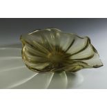 IN THE MANNER OF BARBINI: A BROAD WAVY-EDGED GILT GLASS BOWL, or centrepiece, 18.25" wide