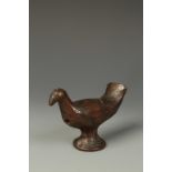 A DARK GLAZED STONEWARE BIRD WHISTLE, 18th/early 19th century, 3.5" high