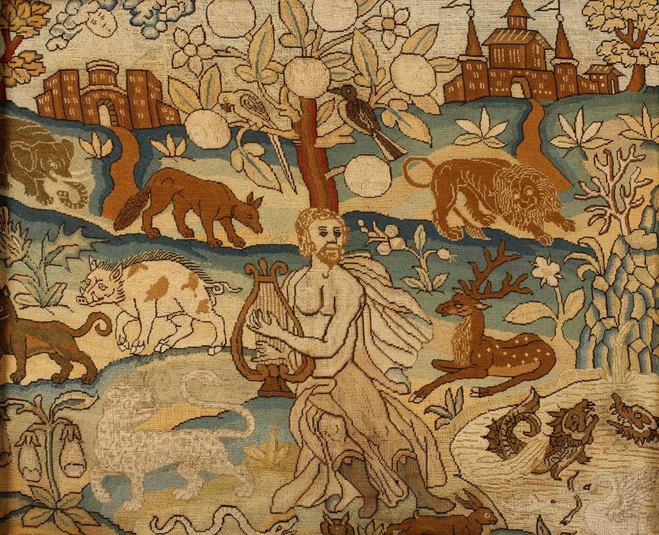 A FINELY WORKED NEEDLEWORK PICTURE OF ORPHEUS PLAYING A HARP surrounded by animals in a stylised