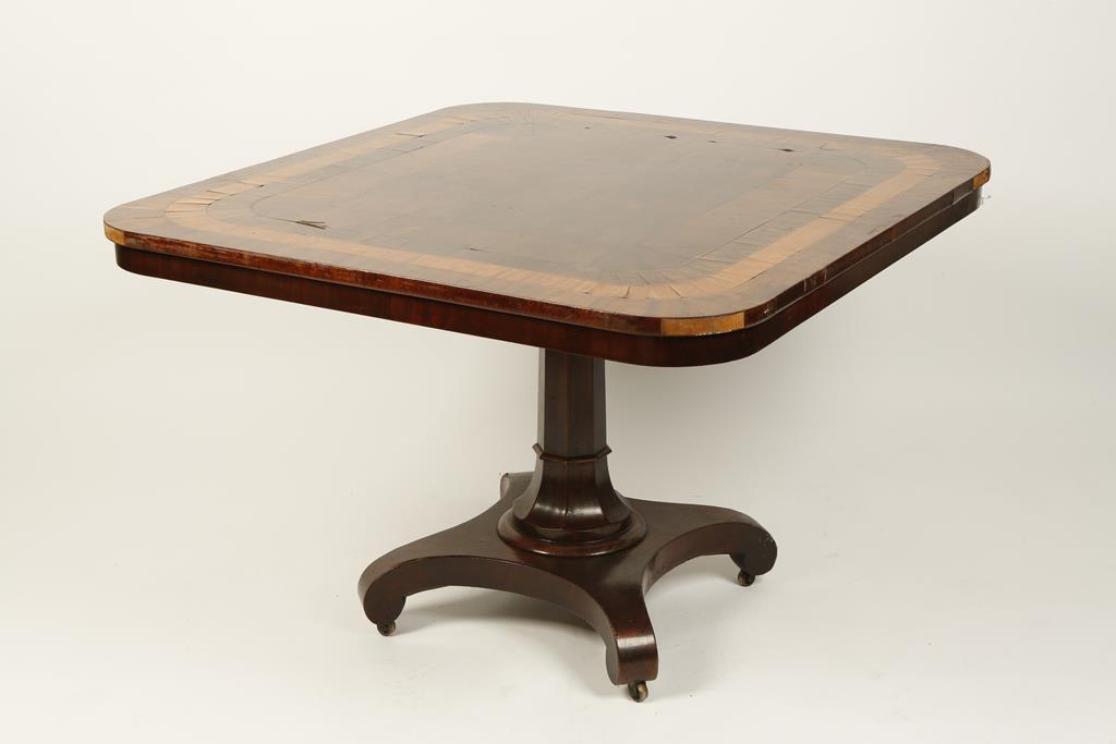 A MAHOGANY, SATINWOOD AND ROSEWOOD VENEERED OCCASIONAL TABLE with radiating bands of veneer on a
