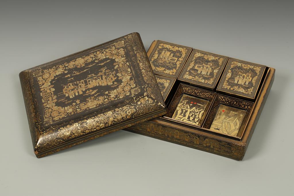 A CANTON EXPORT LACQUER-WORK BOX, all over decorated and closing lidded compartments, 11.75" wide