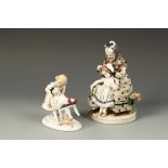 KATZHÜTTE: A PORCELAIN GROUP OF A GIRL, BABY AND BEAR painted in polychrome with blue printed