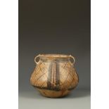 A CHINESE NEOLITHIC POTTERY JAR with geometric decoration, 6" high