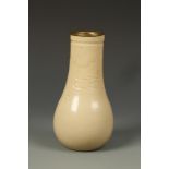 MANNER OF CHARLES VYSE (1882-1971): A POTTERY VASE incised with Oriental style scrolls against a