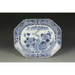 A CHINESE BLUE AND WHITE OCTAGONAL SERVING DISH decorated with a garden landscape, Qianlong, 18"