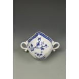 A BOW BLUE AND WHITE PORCELAIN SAUCE BOAT, double lipped with two handles, painted with a bird on