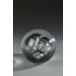 BARBINI: A CLEAR GLASS PAPER WEIGHT, with three bubble inclusions, signed 'Barbini Murano', 4" dia.