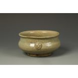 A CHINESE CRACKLE-GLAZED CELADON CENSER with mask handles, Ming/Qing, 6" dia.