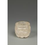 A SAFAVID STYLE ROCK CRYSTAL CYLINDRICAL VESSEL, probably an ink pot, the exterior two lunette