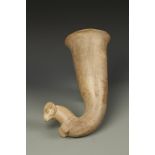 AN AMLASH STYLE TERRACOTTA RHYTON, of tapering form, with a stylised ram base, 12" long